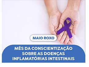 Mão Segurando o Simbolo Roxo da Luta contra Doenças Intestinais